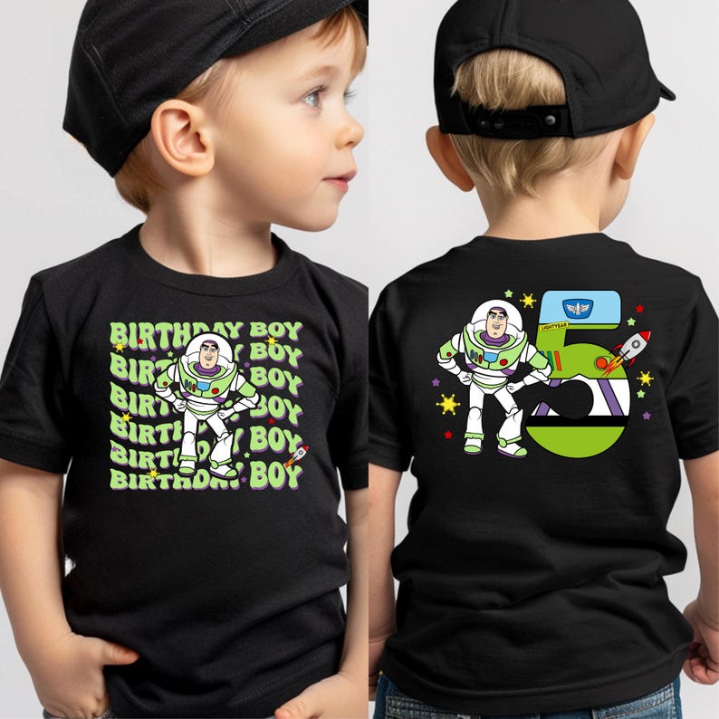 two young boys wearing matching shirts and hats