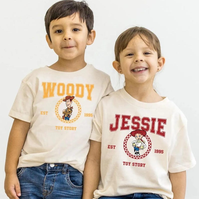 a couple of kids standing next to each other