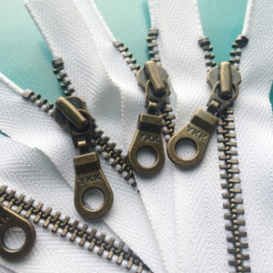 YKK Zippers Antique Brass Donut Pull Metal Zipper 501 White 5 Pieces Available in 4,5,6,7,8,9,10,12,14, and 18 inches imagem 1