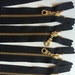 YKK Brass Gold Metal Donut Pull Zippers (5) Pieces - Black 580- Available in 4,5,6,7,8,9,10,11,12,13,14,16,18,20 and 22 Inch 