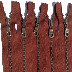 YKK Metal Teeth Zippers Rusty Red Brown Antique Brass Donut Pull-Color 236 Cayenne 5 Pieces Currently available in 9,11, or 14 Inch image 1