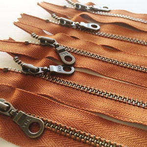 Metal Teeth Zippers- YKK Antique Brass Donut Pull Number 4.5s- 5 pc Rust Orange #102- Available in 4,5,6,7,8,9,10,11,12, 14 and 18 inches