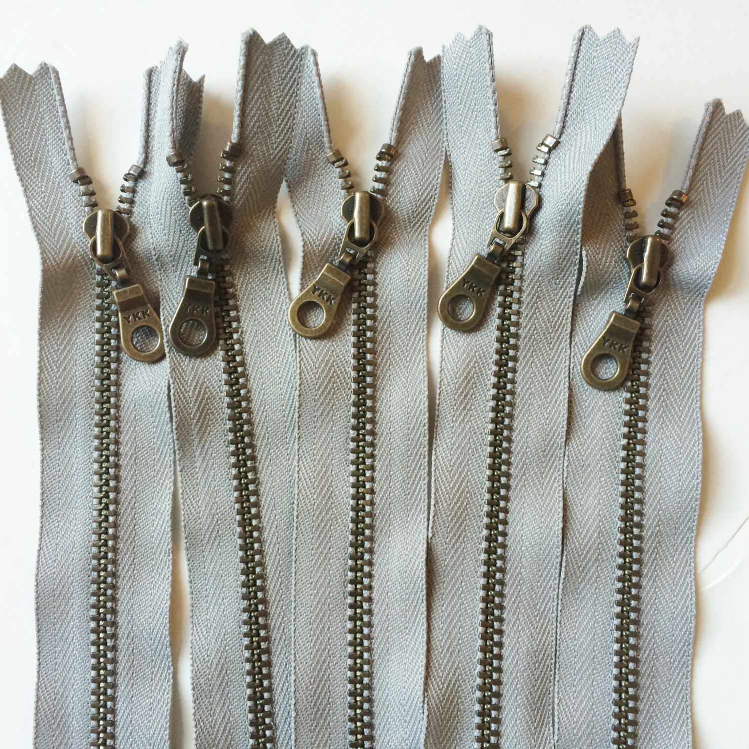 YKK Metal Teeth Zippers- Wet Cement Grey Antique Brass Donut Pull Col…