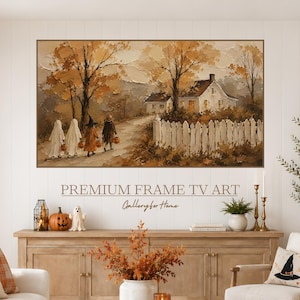 May include: A rectangular wall art print featuring an oil painting of a rural autumn scene with two children in ghost costumes and two children in witch costumes walking along a path toward a white house behind a white picket fence.