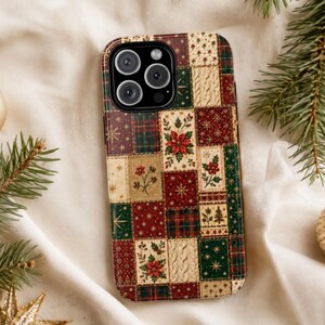 May include: A smartphone case featuring a patchwork design of festive holiday patterns including poinsettias, holly berries, pine trees, snowflakes, and cable knit textures in shades of red, dark green, gold, and cream.