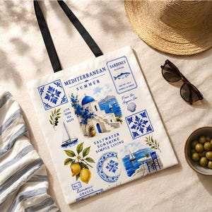 Santorini Greece inspired tote bag with Mediterranean coastal artwork featuring blue and white tiles, lemons, sailboats, seaside scenery, and vintage Greek summer illustrations.