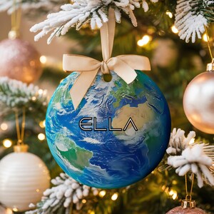 A space gift ornament of planet Earth with a custom name.