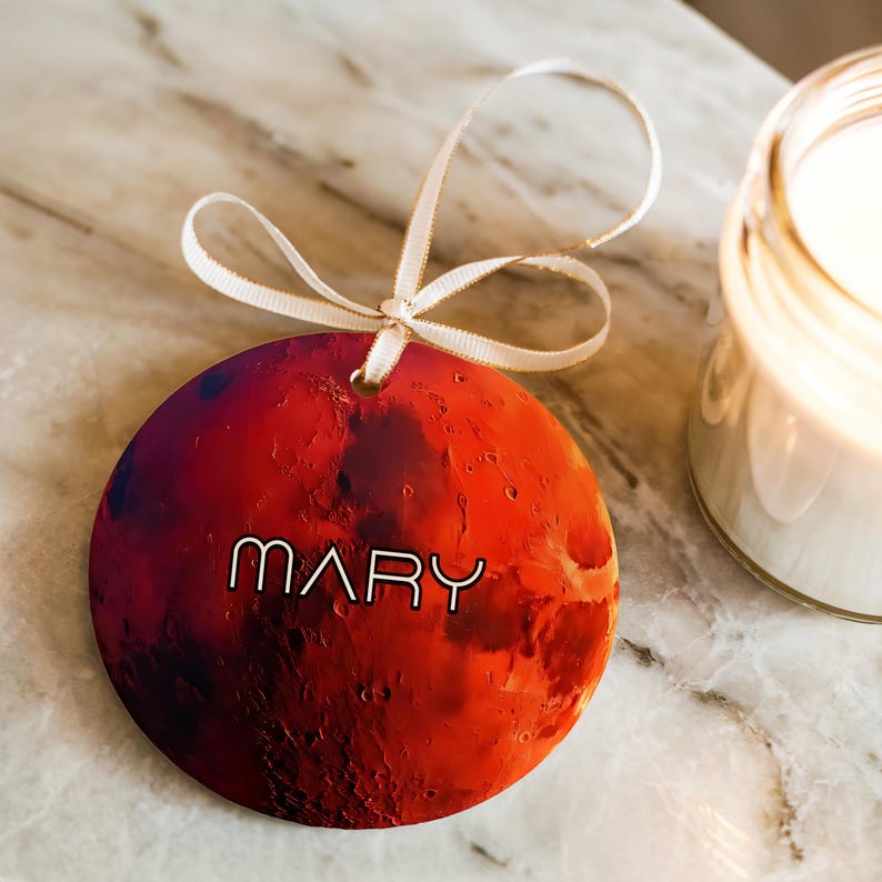 A space gift ornament of planet Mars with a custom name.
