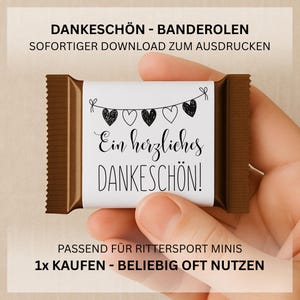 Könnte beinhalten: Ein brauner Schokoriegel-Wrapper mit dem Text "Ein herzliches DANKESCHÖN!" und einer Girlande aus Herzdekorationen. Oben steht "DANKESCHÖN - BANDEROLEN" und "SOFORTIGER DOWNLOAD ZUM AUSDRUCKEN". Der Text ist schwarz.