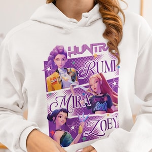 Kpop Demon Hunters Hoodie – Huntrix Girls (Rumi, Mira, Zoey) Graphic Hoodie – Purple Kpop Sweatshirt for Fans & Collectors