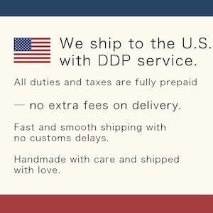 May include: Text on a cream-colored background with a blue and red border. The text includes "We ship to the U.S. with DDP service." and "All duties and taxes are fully prepaid - no extra fees on delivery."