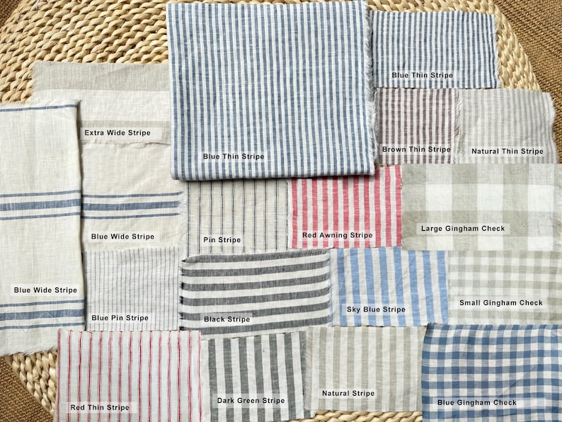 May include: A collection of fabric swatches featuring various patterns including blue thin stripes, extra wide stripes, blue wide stripes, pin stripes, red awning stripes, large gingham checks, black stripes, sky blue stripes, small gingham checks, red thin stripes, dark green stripes, natural stripes, and blue gingham checks.