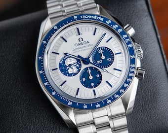 Vintage Omega Speedmaster Silver Snoopy Award 50th 42mm 310.32.42.50.02.001