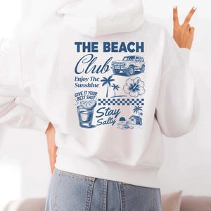 The Beach Club Hoodie – Coastal Hoodie for Beach Lovers, Unisex Summer Sweatshirt, Surf Style Pullover, Ocean Vibes Gift Idea
