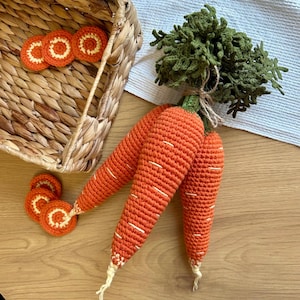 Set of three orange carrots. Handmade knitting carrot. Montessori toy. Amigurumi autumn vegetable. Pretend play food toy. Nursery decor.
