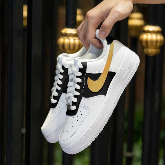 Nike White Sneakers with Black Swoosh and Gold Accent Nike Air Force 1 Low Essential  main image 3