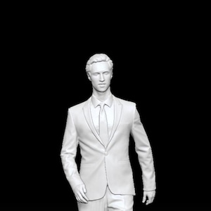May include: A white 3D model of a person wearing a suit, tie, and dress shoes, standing in a forward-facing position. The figure is rendered in a solid matte white finish against a dark background, with the text IE_046 visible at the bottom.