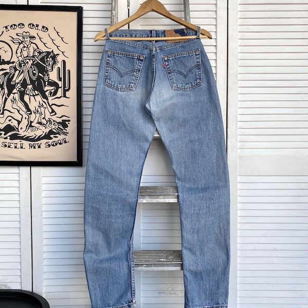 Vintage Levis 534 Light Wash Blue Denim Slim Jeans Pants Made In USA Men’s 27x30