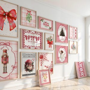 May include: A gallery wall featuring twelve framed Christmas-themed prints with red and white colour schemes. The artwork includes a nutcracker, Santa Claus, a Christmas tree, mistletoe, bows, snowflakes, and text such as Merry Christmas and tis the season.