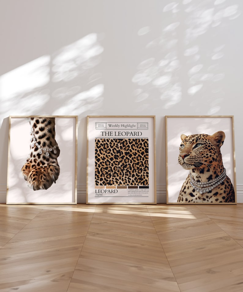 May include: Three framed prints with a leopard theme. The left print shows a close-up of a leopard paw with a diamond necklace. The middle print features a leopard print pattern with the text "THE LEOPARD" and "LEOPARD (leopard)". The right print shows a leopard with a diamond necklace looking to the right.