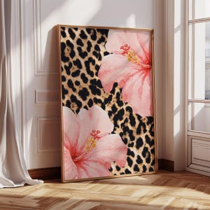 May include: A digital art print featuring a pink hibiscus flower on a brown and black leopard print background.