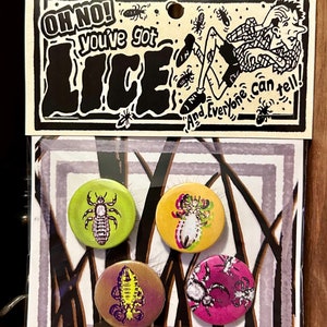 May include: Four round buttons with images of lice on them. The buttons are green, yellow, pink, and brown. The buttons are arranged in a square shape on a black and white background. The text "OH NO! You've got LICE! And everyone can tell!" is on a white background with black text.