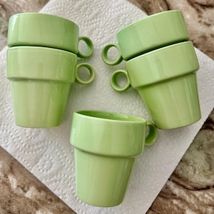 May include: A rustic wooden sign with the text "Welcome to our home" in white lettering. The sign features a distressed finish and a simple, inviting design, perfect for a front porch or entryway.