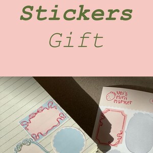 May include: A collection of scrapbook stickers with various shapes and colors, including labels and decorative frames. The stickers are in pastel colors and feature the text "Cutest Scrapbook Stickers Gift" and "Ver's Mini Market".