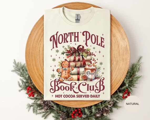 North Pole Book Club Shirt, Hot Cocoa Served Daily Tee, Bookish Christmas T-Shirt, Christmas Reader Shirt, Cozy Bookworm Holiday Graphic Tee