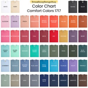 The image is a color chart displaying various comfort colors, including white, black, orange, red, yellow, green, blue, purple, and pink. The chart is organized into rows and columns, with each color listed in a specific row and column. The chart is designed to help customers choose the most comfortable color for their clothing or accessories.