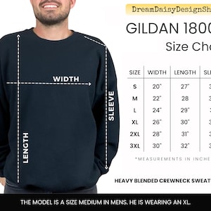 The image is a size chart for a GILDA 18000 crew neck sweatshirt, which is a heavy blended crew neck sweatshirt. The chart provides measurements for the width, sleeve length, sleeve length, and sleeve length in inches. The model is described as a size medium in men, and he is wearing an XL. The image is a collage of multiple images, and the text is concise and avoids redundancy.