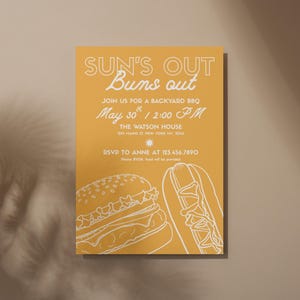 May include: A mustard-yellow invitation with white text and line drawings of a hamburger and hot dog. The text reads "SUN'S OUT Buns out" and invites guests to a backyard BBQ on May 30th at 2:00 PM. Contact Anne at 123.456.7890.