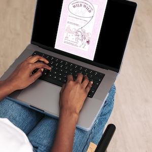 Person using a laptop with the pink “Wild Wild West” invitation displayed on the screen. The image demonstrates easy online editing in Canva, with a cozy workspace setting featuring jeans and a neutral background.