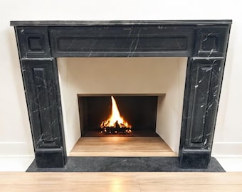 ネロ・マルキナ大理石の暖炉マントルピース：溝付き黒大理石の囲い