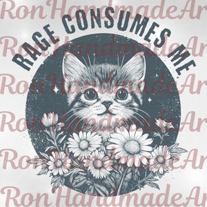 May include: A graphic design featuring a kitten's face within a dark blue circle, surrounded by daisies. The text "RAGE CONSUMES ME" arches above the cat. The design is in shades of gray, white, and pink, creating a vintage aesthetic.