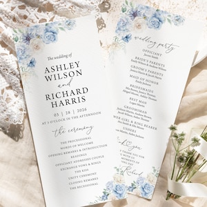May include: Two wedding ceremony programs with floral accents in blue and white. The programs list the wedding party, ceremony details, and names of the bride and groom, Ashley Wilson and Richard Harris.
