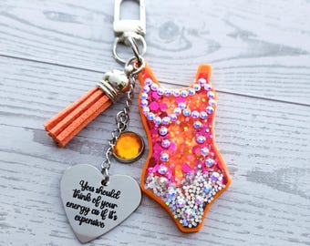 Orange Showgirl Era Keychain – Rhinestone Resin Bag Charm with Engraved Quote