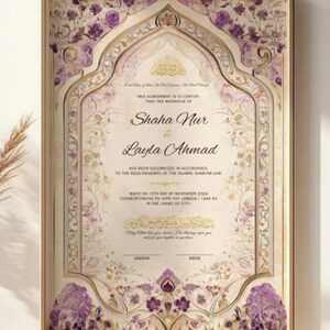 May include: Framed wedding certificate with ornate floral and geometric designs in gold, cream, and purple. The certificate includes the names "Shaha Nur & Layla Ahmad" and text in English and Arabic script. The date of the marriage is November 12th, 2024.