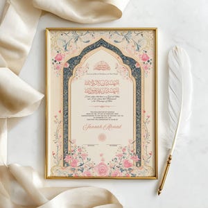 May include: A framed certificate with ornate floral and archway designs in pink, blue, and gold. The certificate features Arabic calligraphy and English text, with a white feather and cream-colored ribbon in the background.