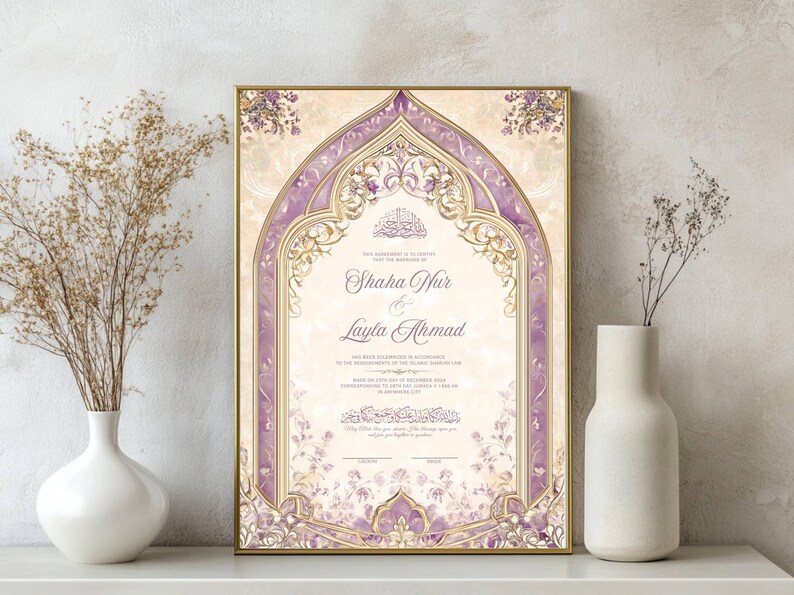 May include: Framed wedding invitation with a gold border, featuring a purple and gold arched design. The invitation includes the names Shaha Nur and Layla Ahmad, with floral accents and Arabic script.