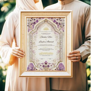 May include: A framed wedding certificate with gold trim, featuring the names "Shaha Nur & Layla Ahmad" in elegant script. The design incorporates purple floral accents and ornate details, held by two people.