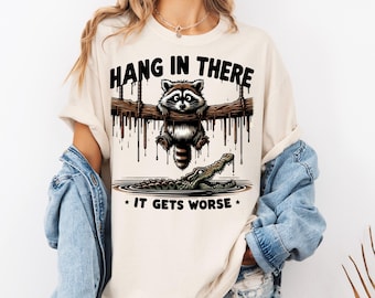 Hang in There It Gets Worse PNG, Funny Sarcastic Raccoon png, Snarky Humor png, Retro Aesthetic png, Sassy Raccoon png, Trendy Sublimation