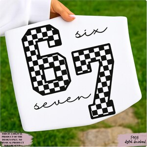 May include: White digital design featuring the numbers "67" in a black and white checkered pattern, with the words "six" and "seven" in cursive. The design is held by a person. The bottom left corner reads "THIS IS A DIGITAL PRODUCT OF THE DESIGN ONLY. NO PHYSICAL PRODUCT WILL BE SENT."