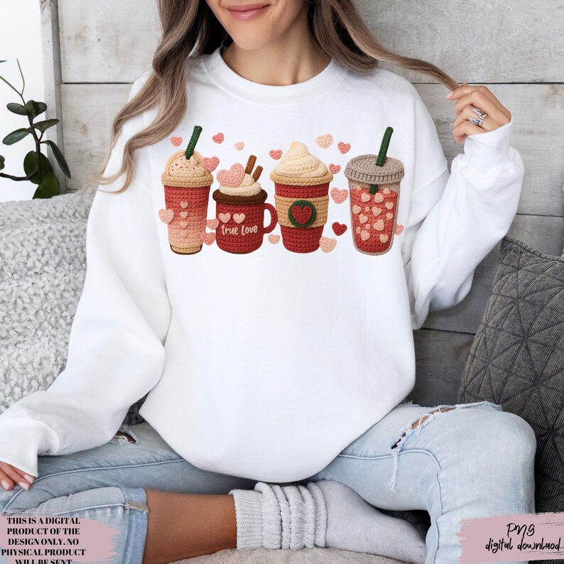May include: White sweatshirt featuring a graphic of four crochet-style coffee drinks with heart accents. One mug says "True Love." The design includes pink, red, and brown colors. The image also includes the text "THIS IS A DIGITAL PRODUCT OF THE DESIGN ONLY. NO PHYSICAL PRODUCT WILL BE SENT. Png digital download."