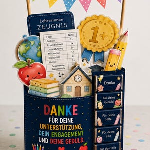 May include: A dark blue gift container featuring the text "DANKE F&Uuml;R DEINE UNTERST&Uuml;TZUNG, DEIN ENGAGEMENT UND DEINE GEDULD." It is decorated with school-themed cutouts including a report card, a gold medal, a globe, books, and a schoolhouse.