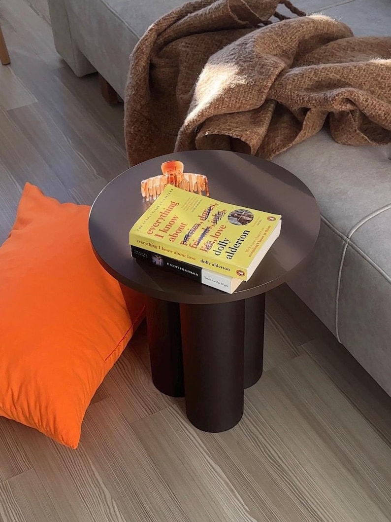 Small round lamp table that adds warmth and character to any corner