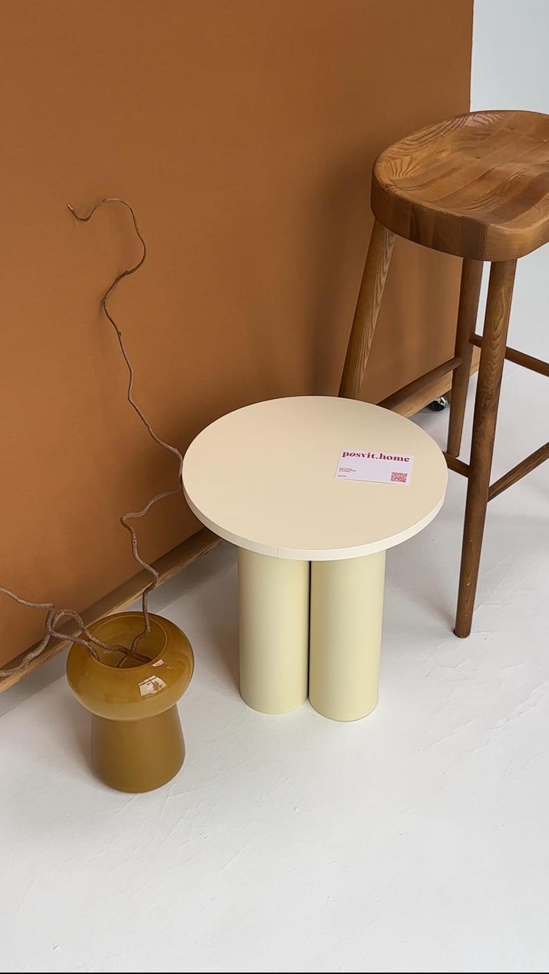 Handcrafted round side table for a touch of charm in any room