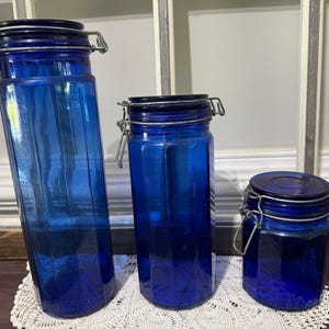Vintage Cobalt Blue Glass Canisters Set 12.5”,  9.5&quot;, 5.5” Tall 12 Paneled Kitchen Storage Jars  with Wire Trigger Bail Lids Set of 3