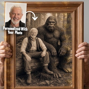 May include: A framed sepia-toned portrait featuring a man sitting on a log next to a large, hairy creature in a forest. An inset photo shows the man's face with the text Personalized With Your Photo, connected by a white arrow to the main image.