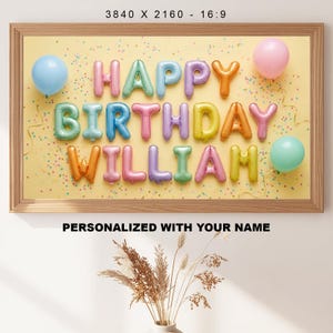 May include: A framed birthday-themed artwork with the words "HAPPY BIRTHDAY WILLIAM" spelled out in colorful balloon letters. The background is yellow with confetti and balloons.
